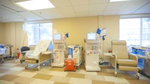 Two dialysis machine in a room.